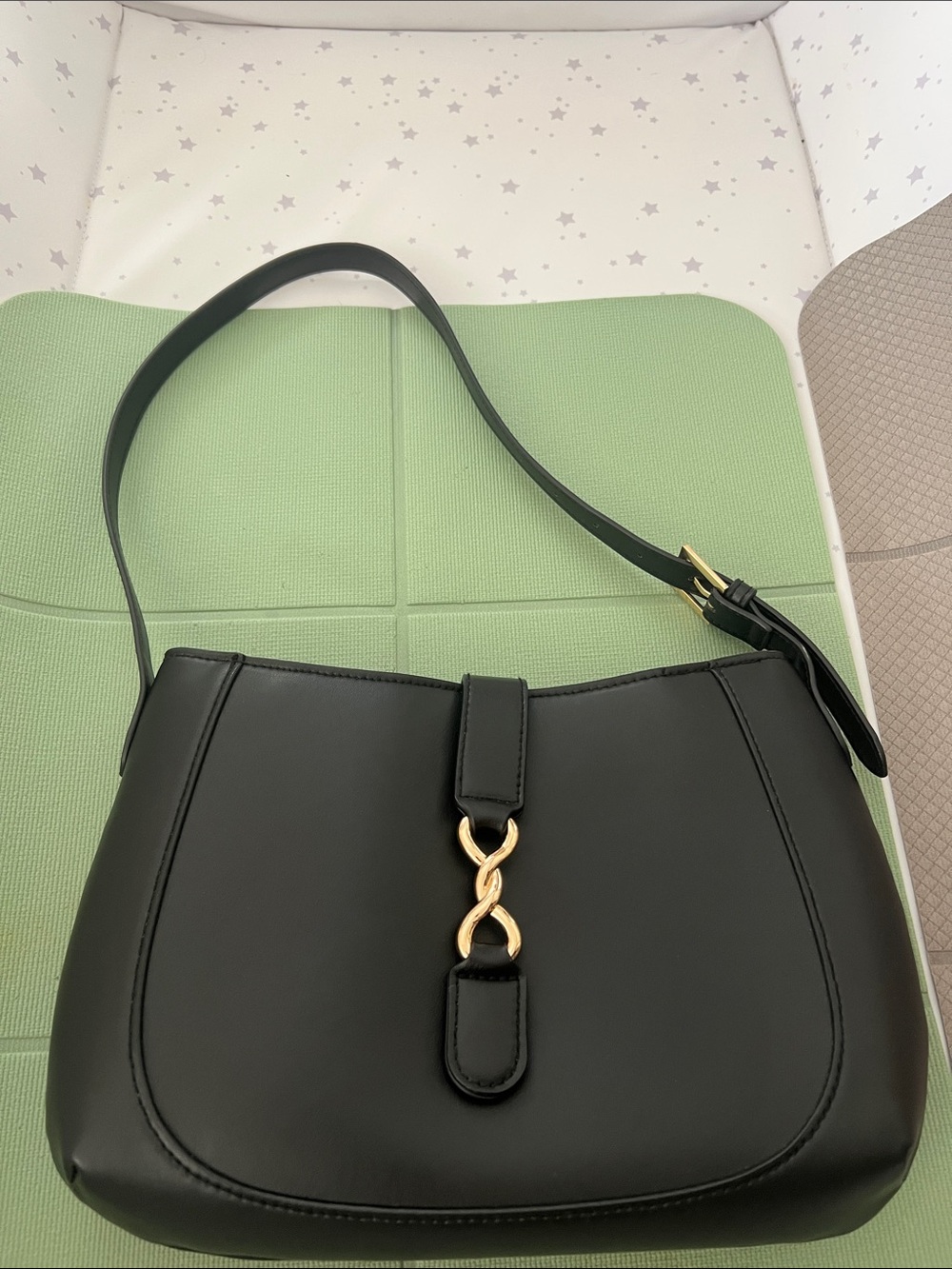 A new day, black shoulder bag